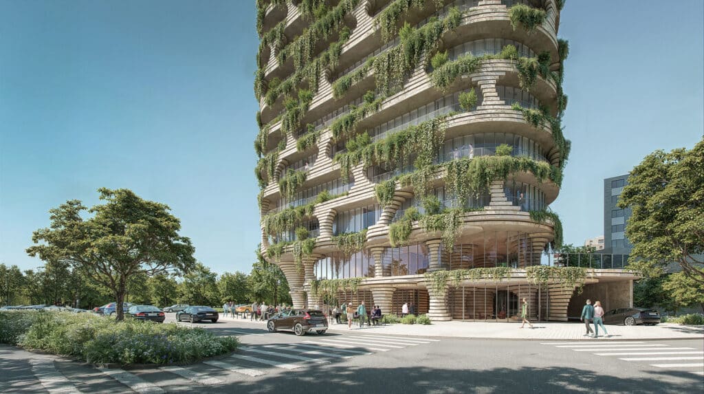 Qapital Tower street-level facade with carved balconies and integrated greenery in Quito