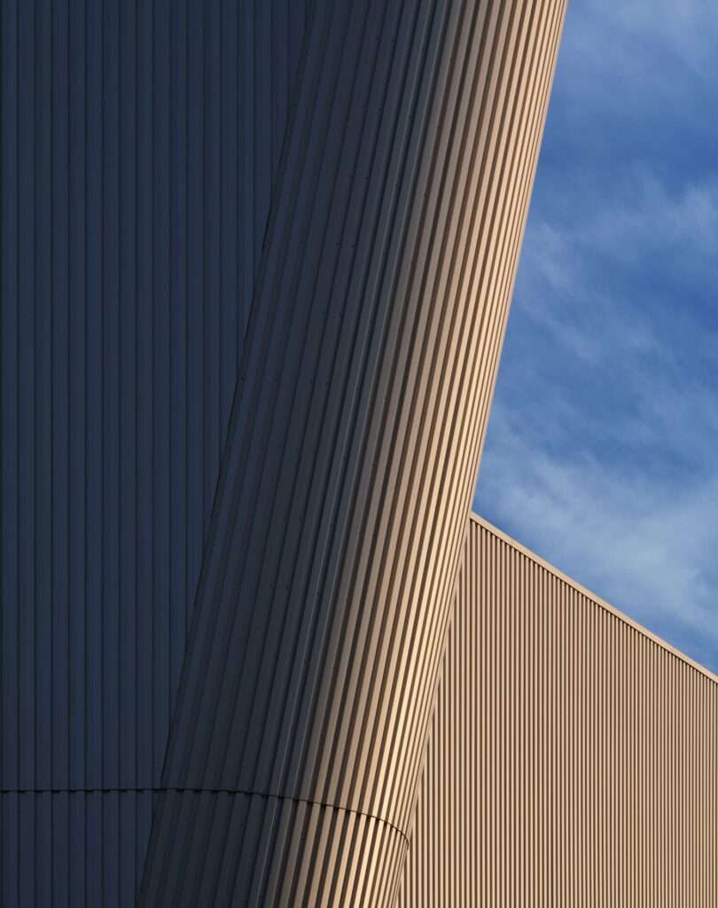 Beth Shalom synagogue corrugated metal addition prairie landscape Kansas golden hour