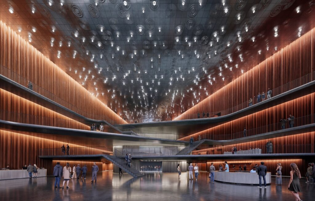 Multi-level foyer interior of TPAC Nashville with warm timber walls and sculptural ceiling