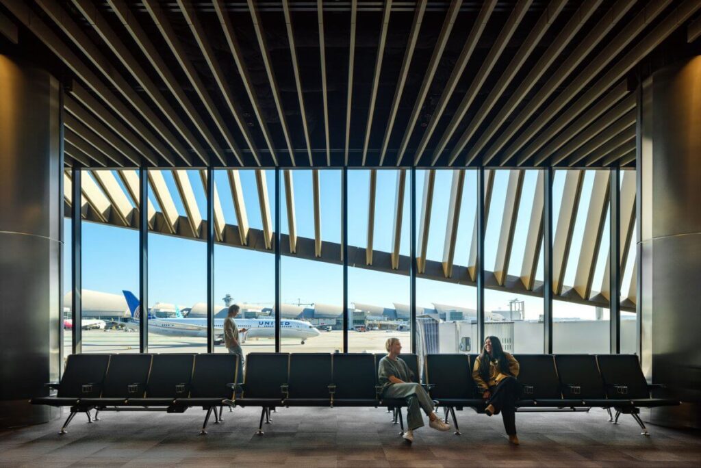 Passenger seating area with floor-to-ceiling glazing at MSC South