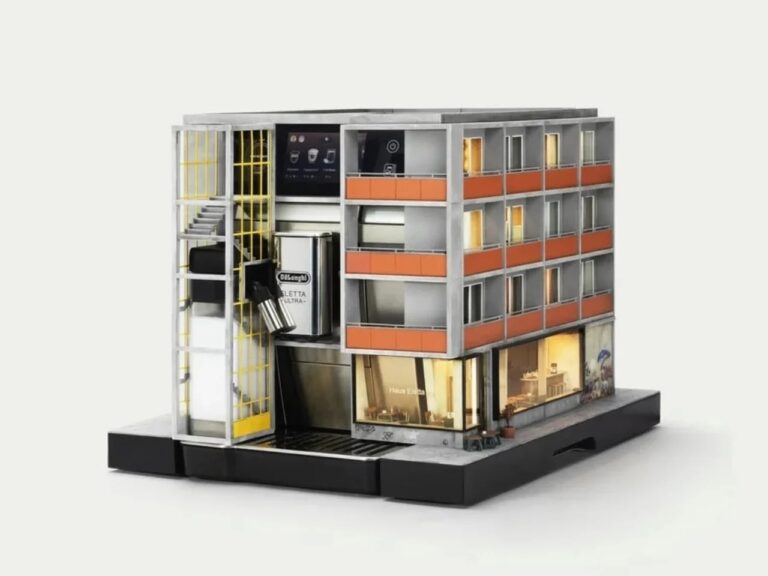 Modern industrial miniature apartment building integrated into a De’Longhi Eletta Ultra coffee machine.