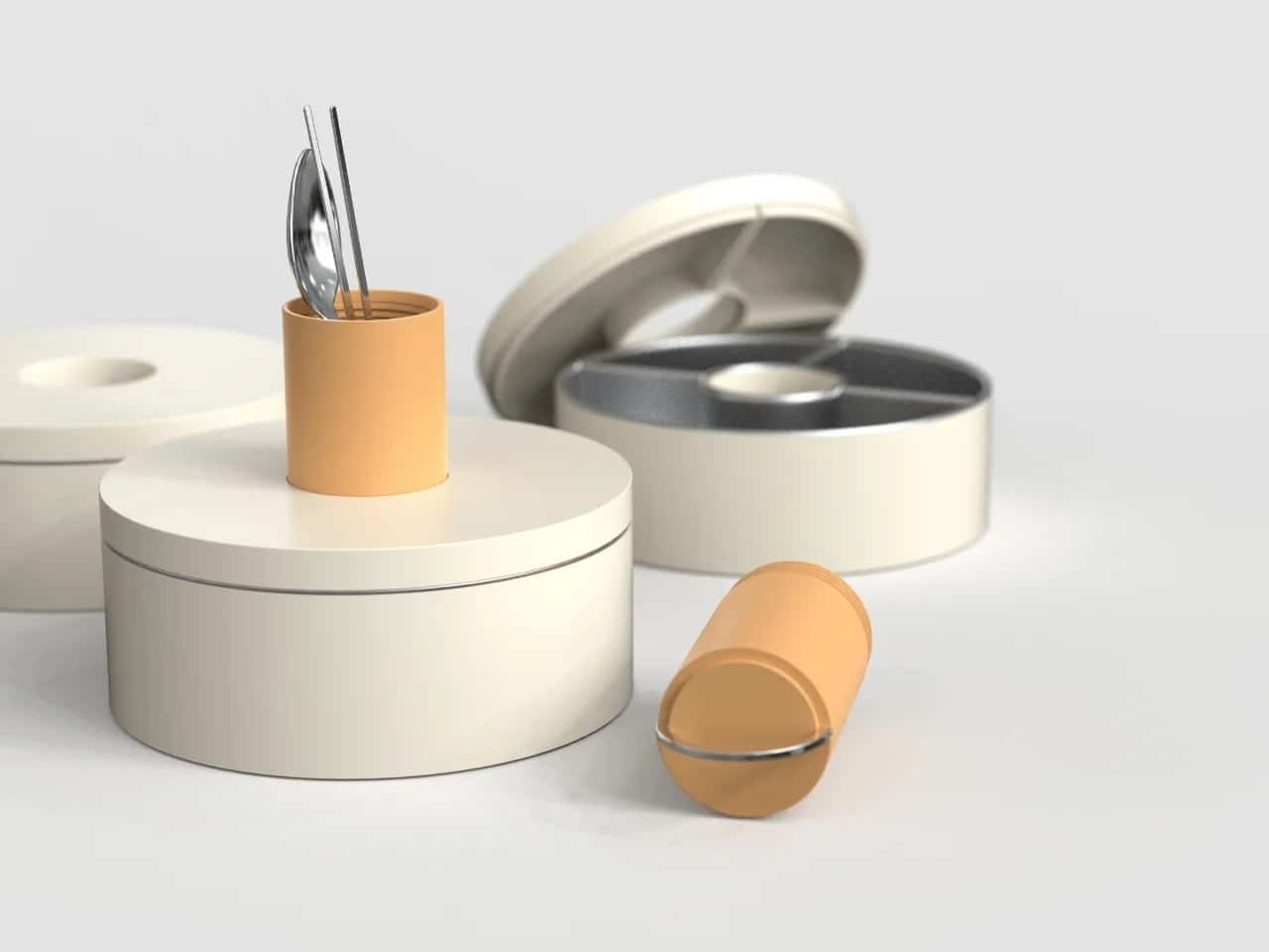 Exploded view of the Ring Lunch Box showing the central cylinder and modular ring containers.