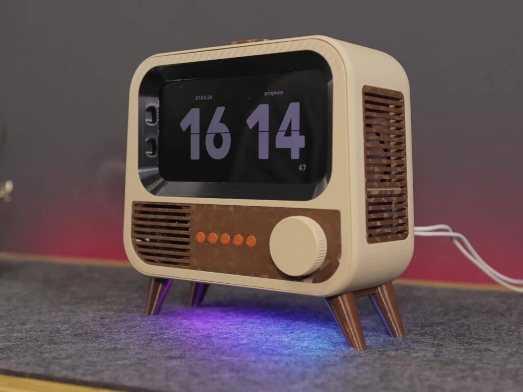 Side view of the smart speaker showing the speaker grill and the glowing purple light beneath the vintage-style legs.