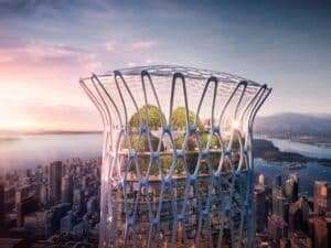 A close-up aerial view of the biomorphic crown of 595 West Georgia Street skyscraper at sunset, showing the white exoskeleton structure, glass facade, and a multi-story indoor public sky garden with trees and visitors.