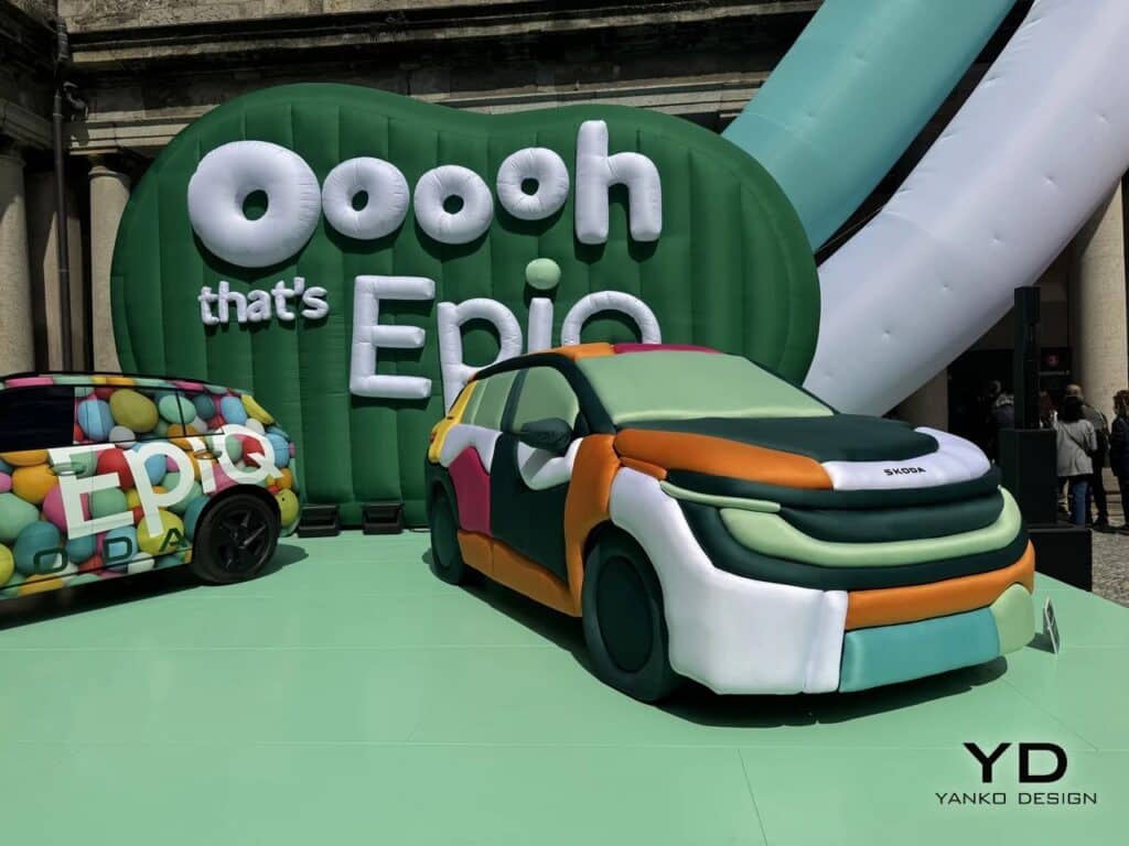 Installation view of Skoda Epiq cars at Palazzo del Senato with "Oooh that's Epiq" inflatable backdrop.
