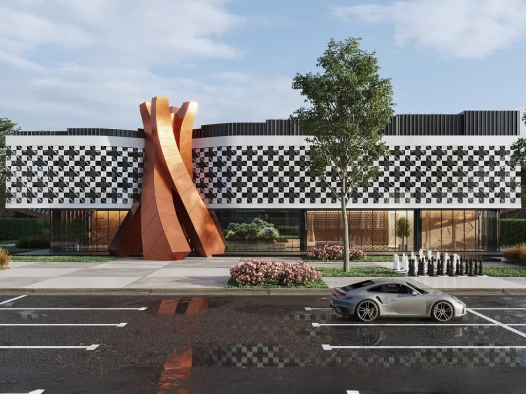 Ground-level elevation of the Batumi Chess Palace with a luxury silver car in the foreground, showing the full length of the checkered facade and outdoor chess pieces on the pavement.