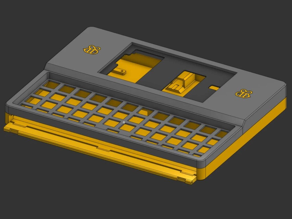 3D CAD rendering of the Bee Write Back chassis showing the yellow base and black top frame design.