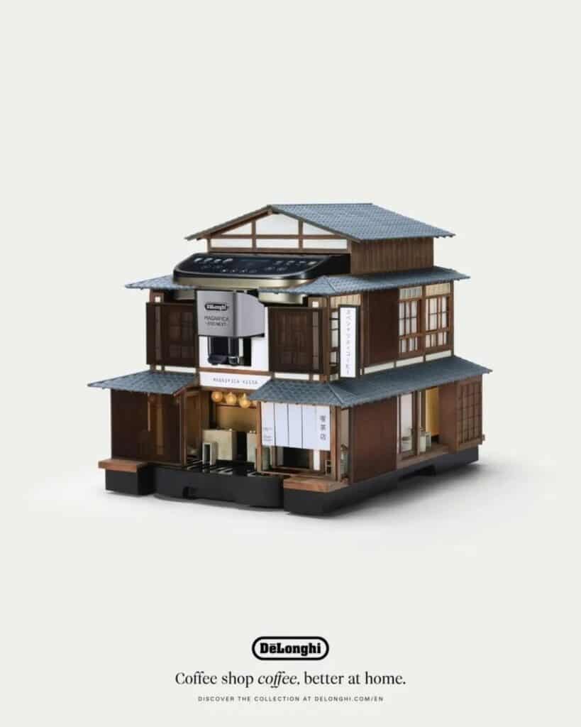 Traditional Japanese Machiya architecture miniature on a De&rsquo;Longhi Magnifica Evo coffee machine.