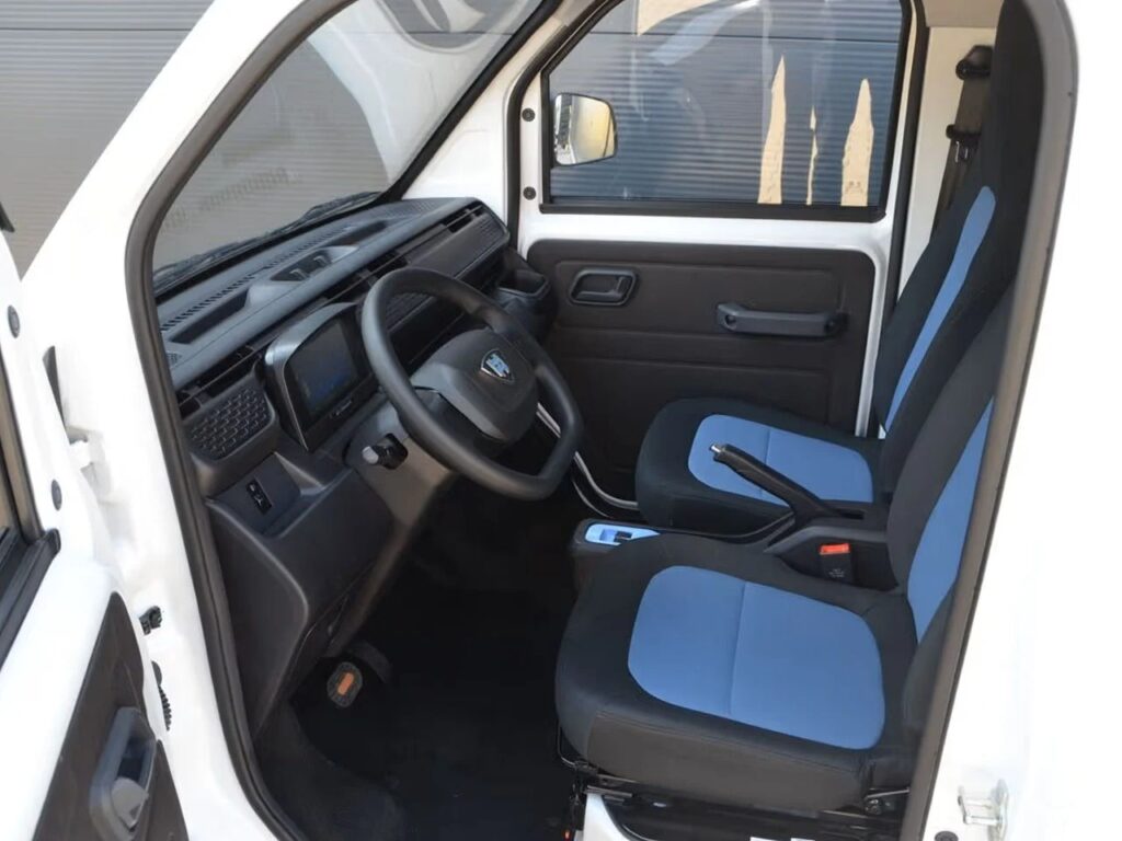 Interior view of the Ari 458 Pro cockpit featuring two-tone blue and black seats and a minimalist dashboard.