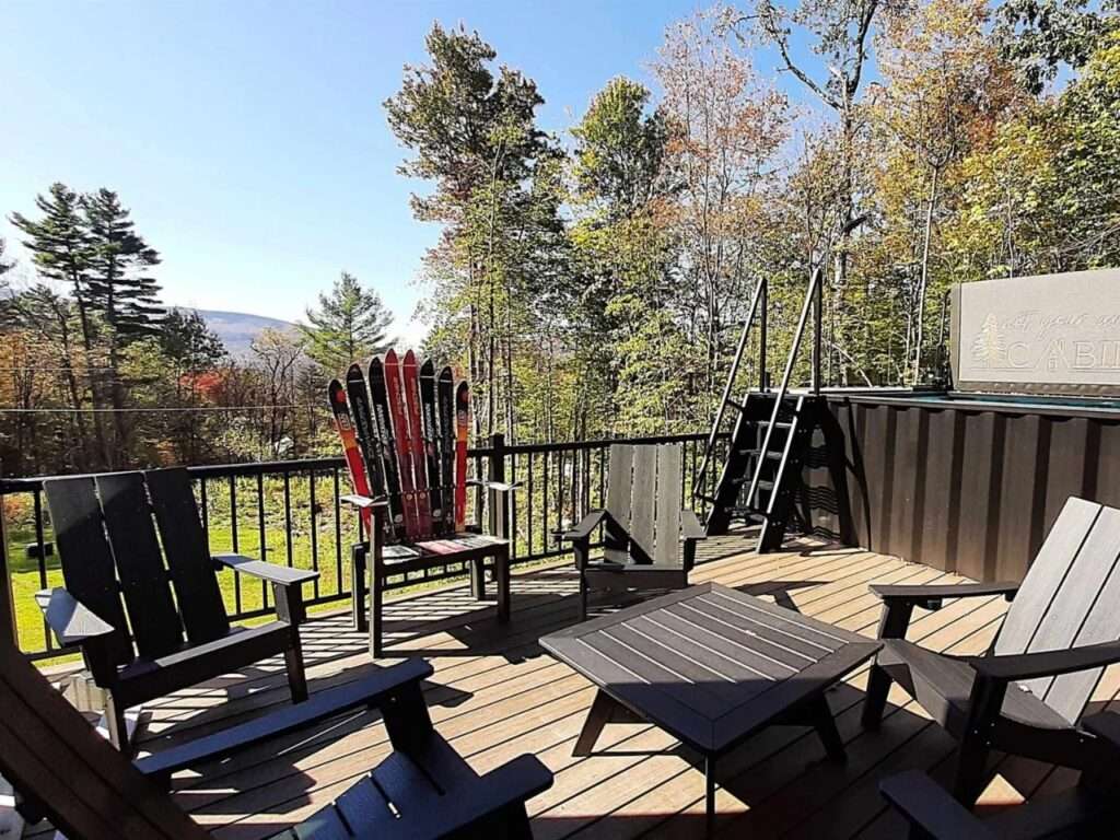 Rooftop deck at Fairmont Villa featuring a wellness unit with a cold plunge pool and custom ski-back chairs.