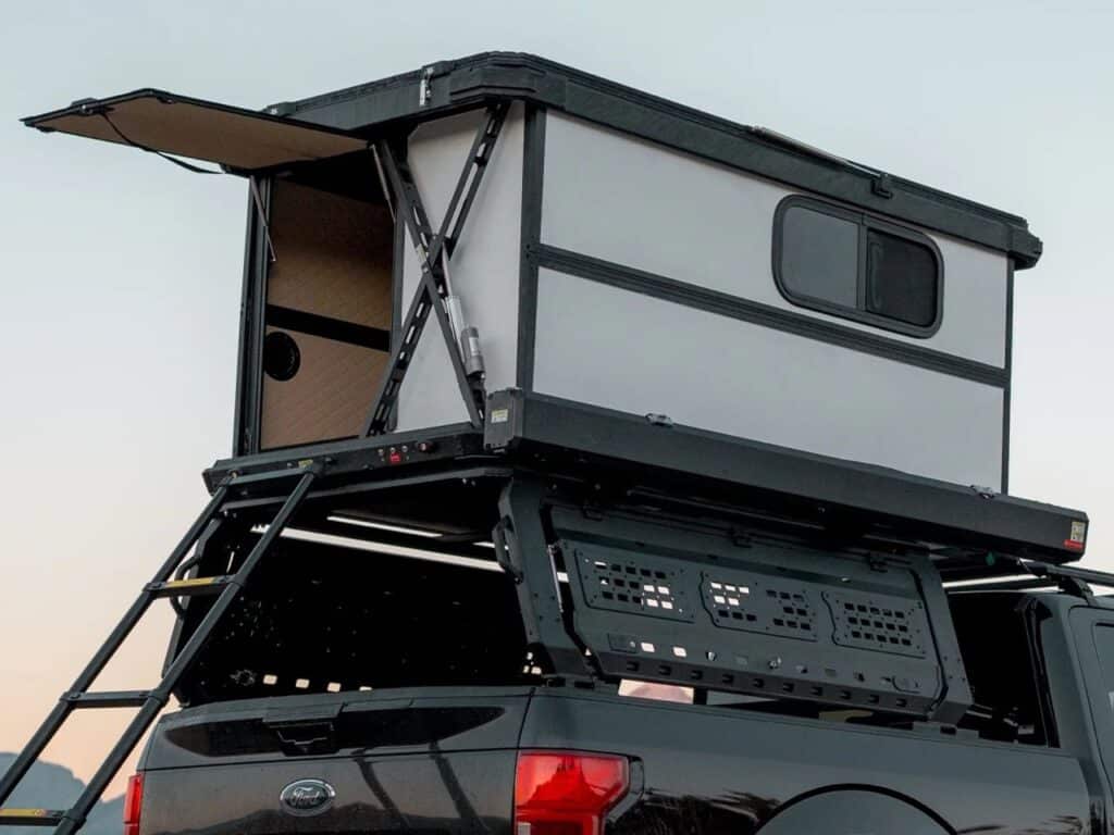 Close-up of the Altus hardwall cabin's lifting mechanism and structural side panels.