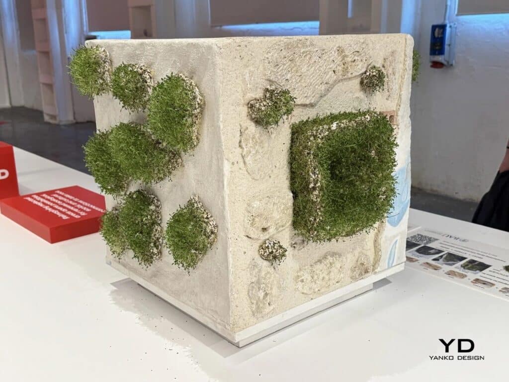 Perspective view of a wall model with a large square moss-covered cavity.