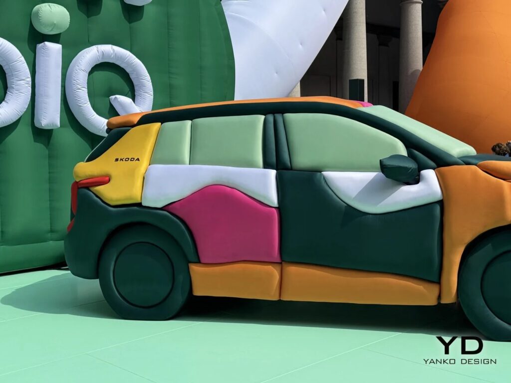 Close-up of the side panels of the inflatable Skoda Epiq showing textile textures and "Skoda" branding.