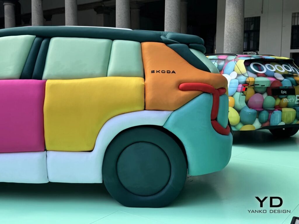 Rear quarter view of the Skoda Epiq showing inflatable tail light area and "Skoda" logo on fabric.