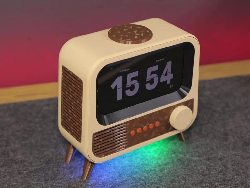 High-angle view of the retro smart speaker showing the wireless charging pad on top.