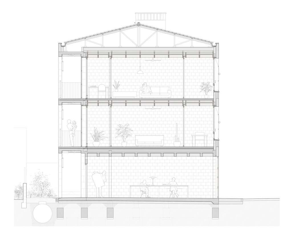 Architectural cross-section of the building showing the load-bearing stone walls, timber slabs, and internal living heights.