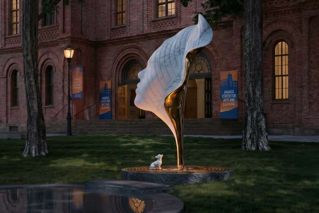 Towering Billie Holiday monument shaped as a white marble gardenia petal with a bronze stem and small white dog at base, set on a circular granite plinth before the red brick Romanesque facade of Jamaica Center for Arts and Learning at dusk