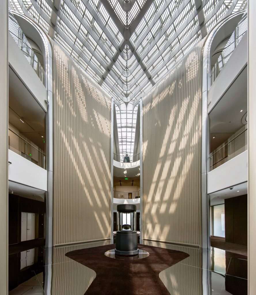 Landscaped courtyard between two curved volumes of the Shanghai art gallery