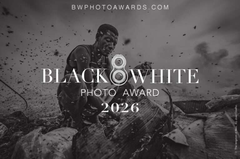 Black and White Photo Awards 2026 promotional poster celebrating international monochrome photography across architecture, street, portrait, landscape, and wildlife categories