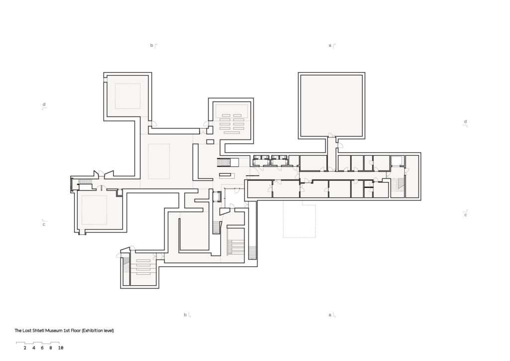 Architectural floor plan of the first-floor exhibition level of The Lost Shtetl Museum, showing the layout of the various gallery "houses."