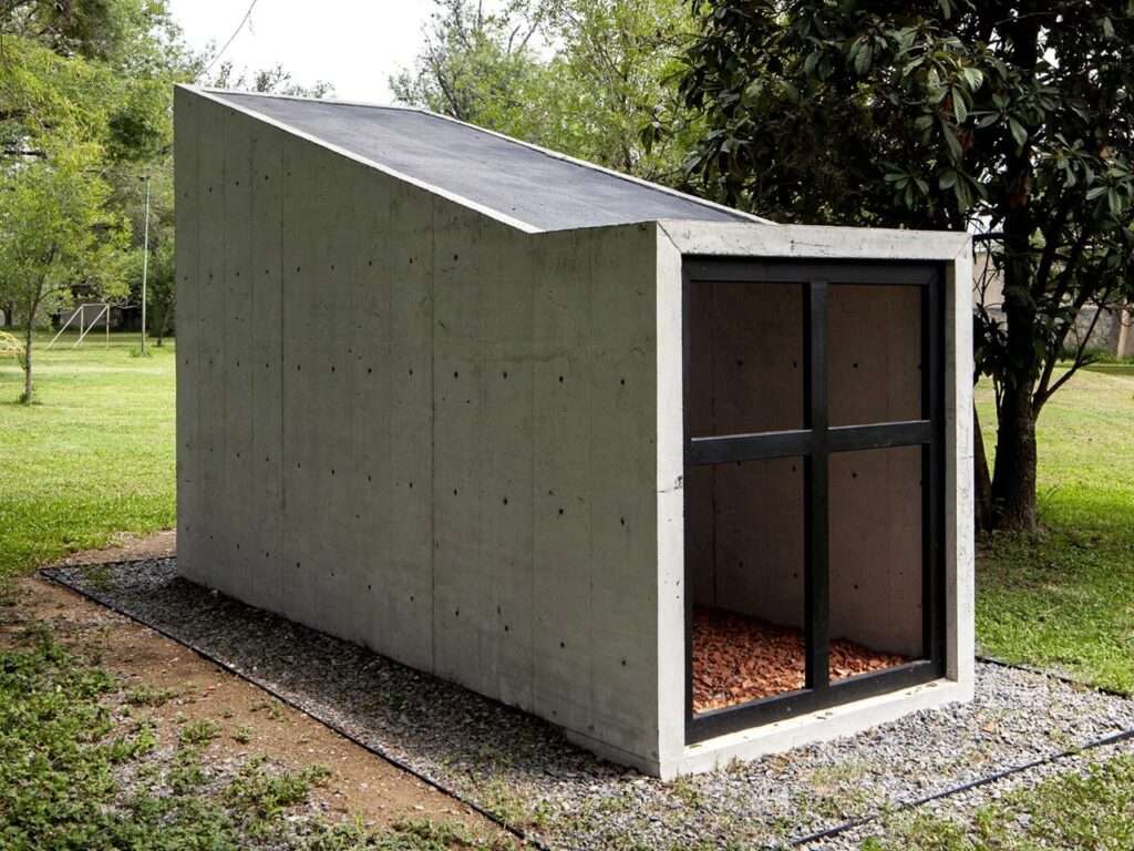 Perspective view of the Oratory Chapel showing the 8cm thick reinforced concrete walls and the diagonal roofline.