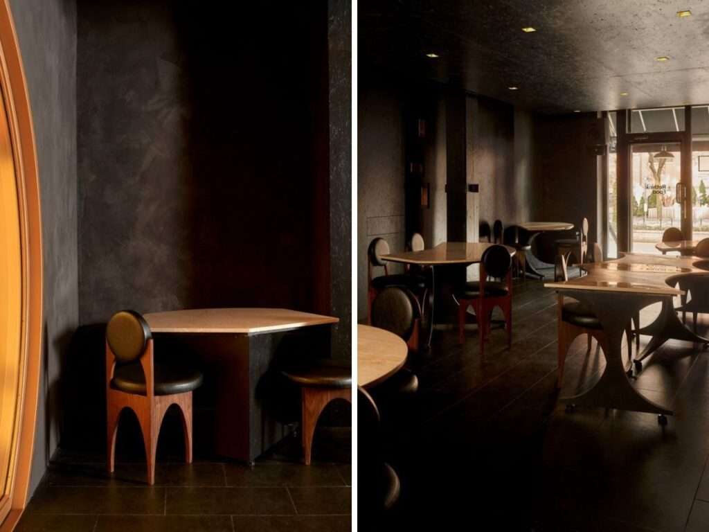 Side-by-side view of Gourmega’s interior showing a walnut wood chair with black vegan leather and the transition toward the street-facing entrance.