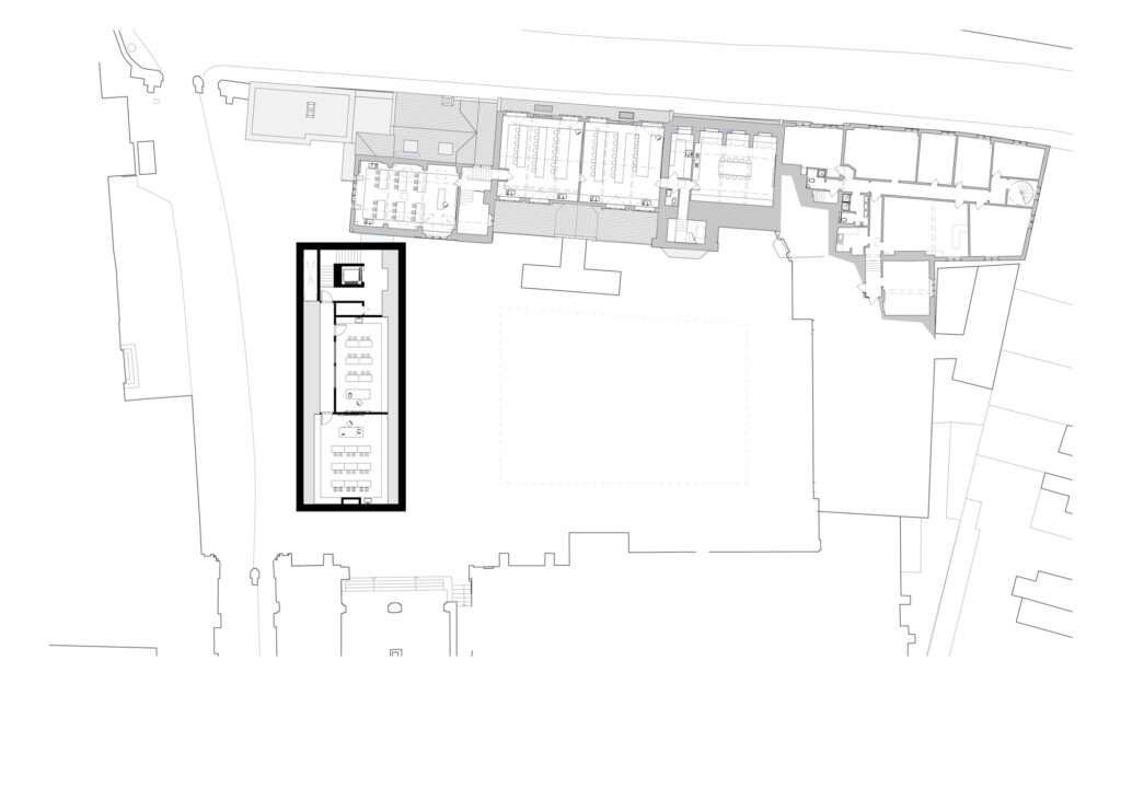 Architectural second floor plan drawing of the Rausing Science Centre highlighting the narrow linear footprint of the new building within the existing school courtyard complex.