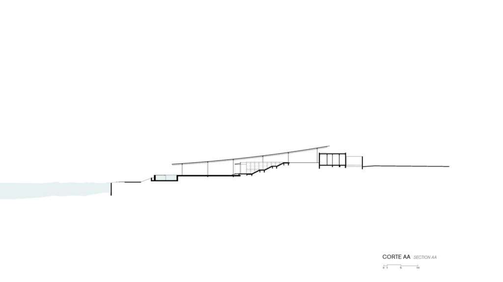 Architectural section drawing (Section AA) showing the House in Minas Gerais embedded in the topography.