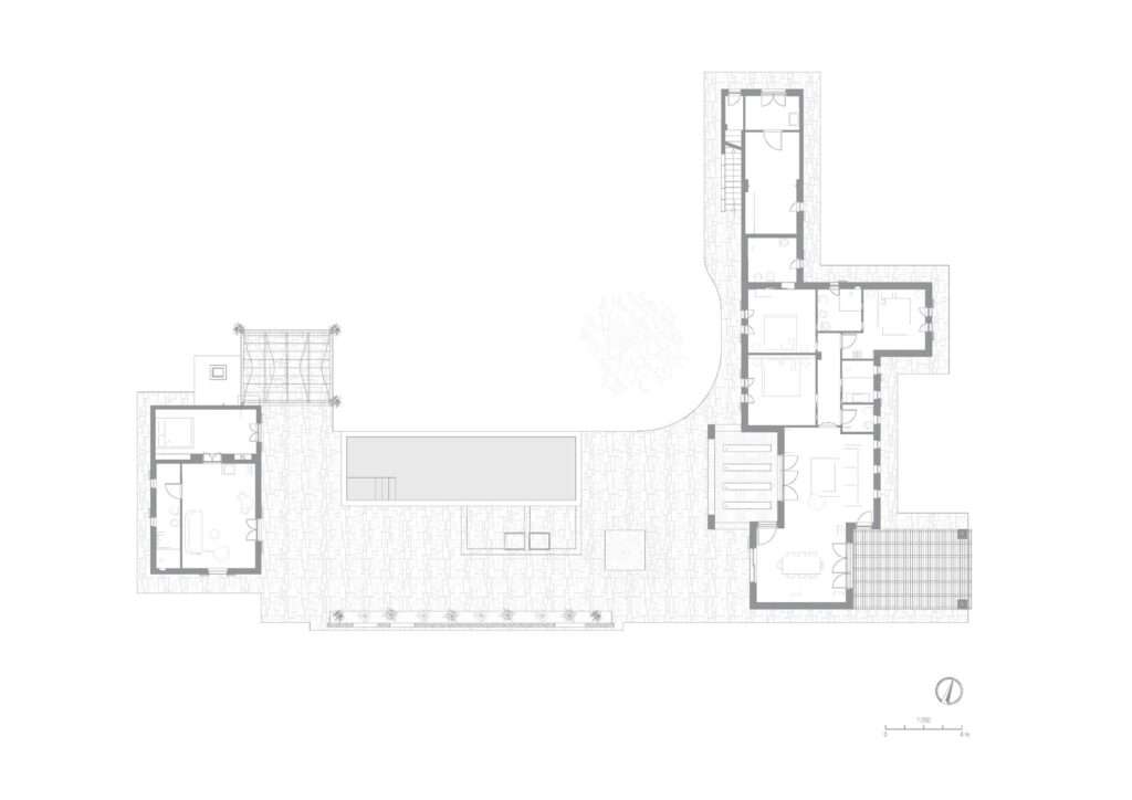 Ground floor plan of Villa Normanni, displaying the layout of living spaces and the converted building.