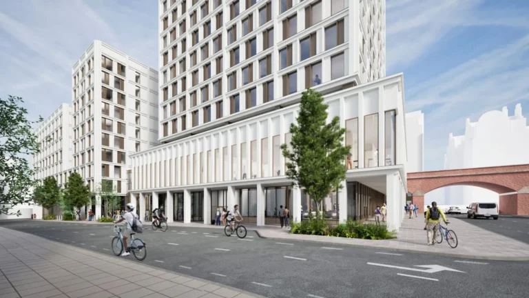 Streetscape rendering showing a white gridded facade module building next to a historic red brick archway with cyclists.