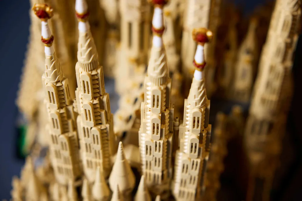 Close-up view of the intricate tan-colored LEGO spires and architectural modules of the Sagrada Família model.