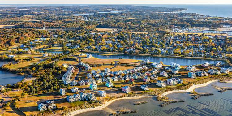 Cape Charles Railroad and Harbor Ideas Competition promotional rendering illustrating waterfront redevelopment, adaptive reuse, and resilient urban design concepts for Virginia's historic harbor