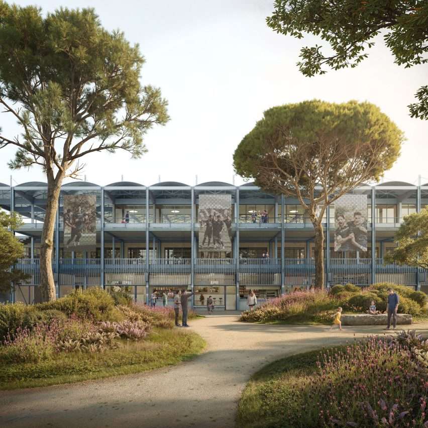 A multi-story gridded steel facade building fronted by a public park with pathways and trees.