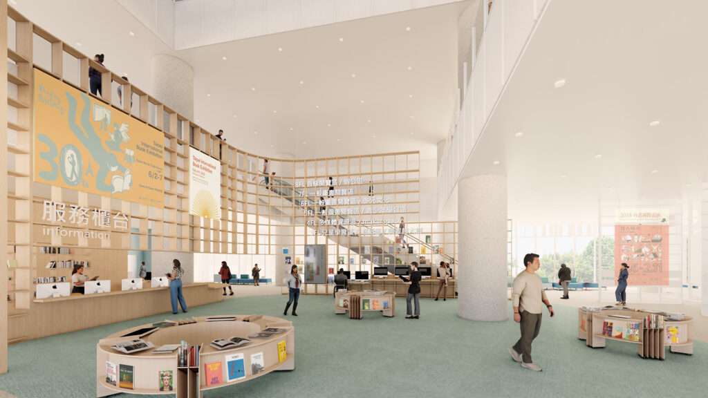 Interior view of a high-ceiling public atrium featuring curved millwork bookshelves and a central information desk.