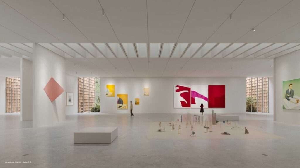 A vast, white-box gallery spaces with polished concrete floors, tall ceilings, and contemporary artwork installations.