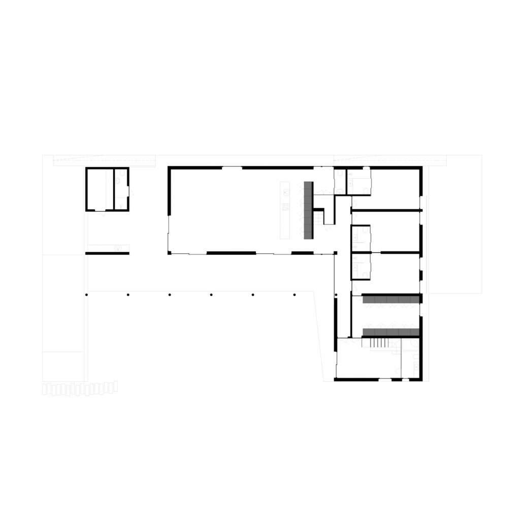 Minimalist 2D architectural floor plan blueprint of an L-shaped house, illustrating the social zone layout, central kitchen island, independent bedroom wings, and private bathrooms.