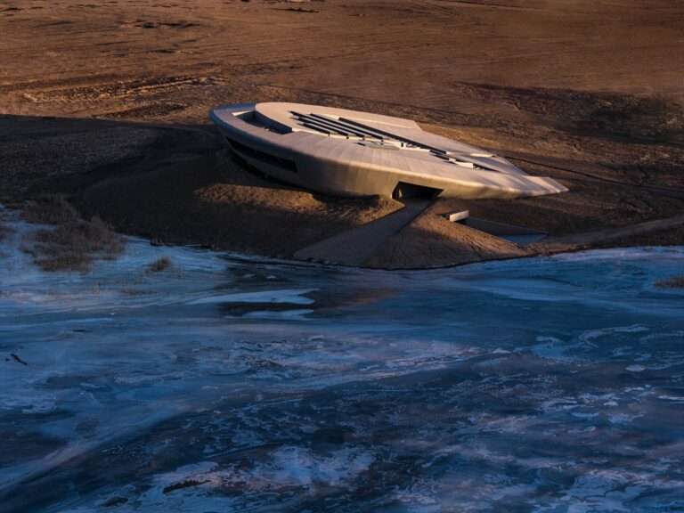 Aerial view of the Prairie Ark project integrated into the Ulanqab grasslands, showing its disc-shaped structure near the frozen lake.