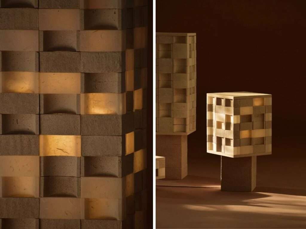 Close-up detail of eggshell bio-composite brick texture on a modular lamp showing unpolished natural surface and warm ambient light.