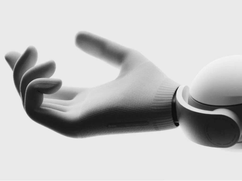 Extreme close-up of the highly dextrous robotic hand of Genesis AI's Enno robot against a bright white background.