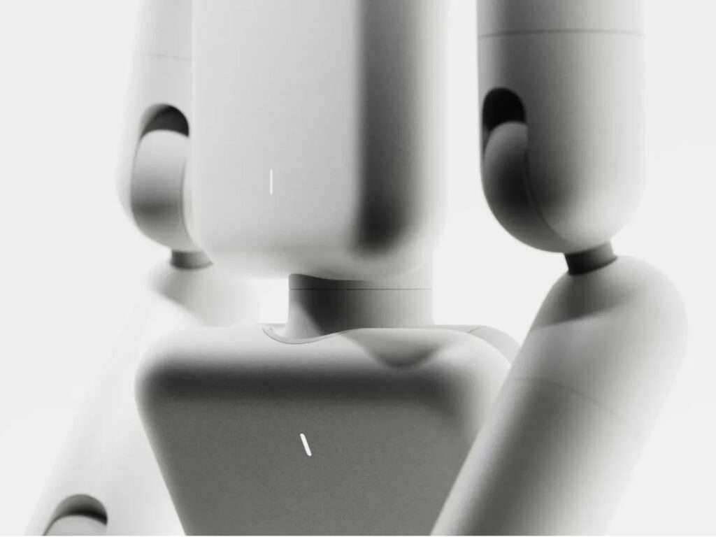 Close-up of the upper torso and status light indicators on the matte white panels of the Enno robot.