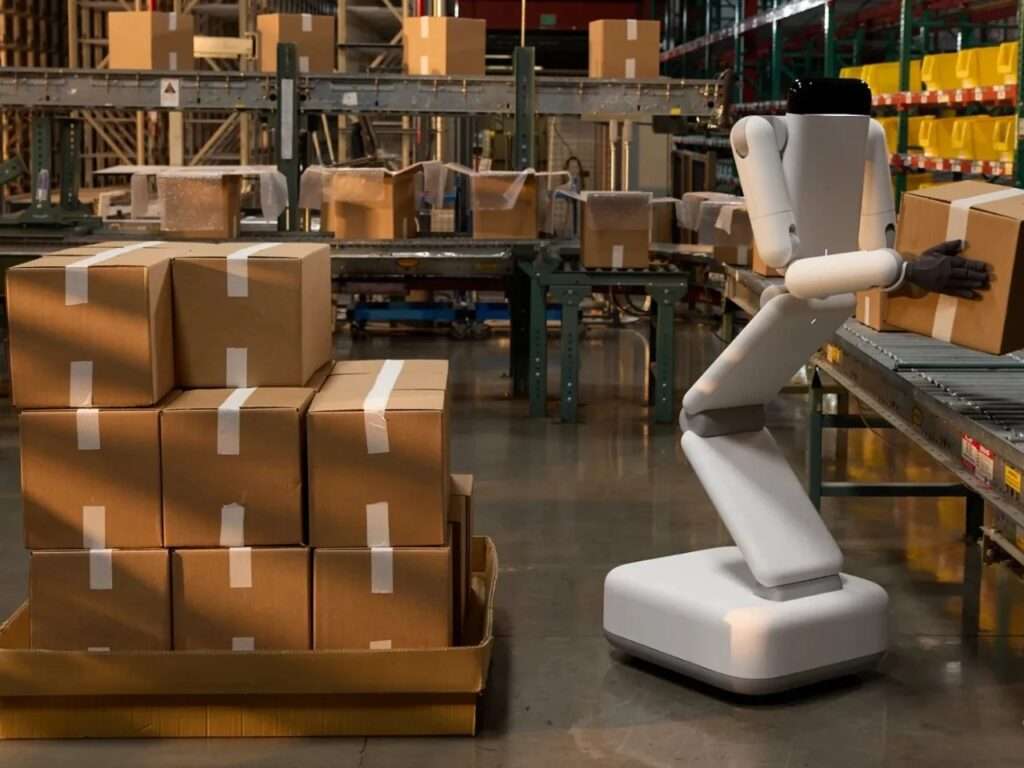 Enno robot lifting a cardboard box from a conveyor belt system inside a busy logistics warehouse.