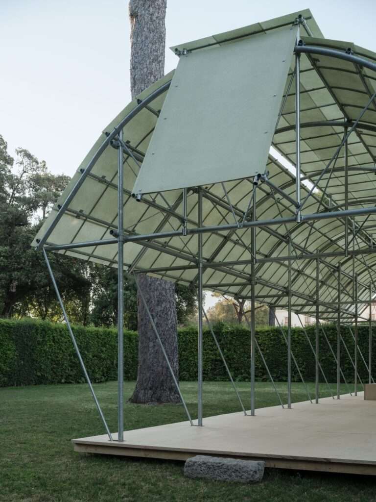 Close-up of the vaulted, translucent canopy and scaffolding-like structure of the Cabane 7L pavilion in Rome.