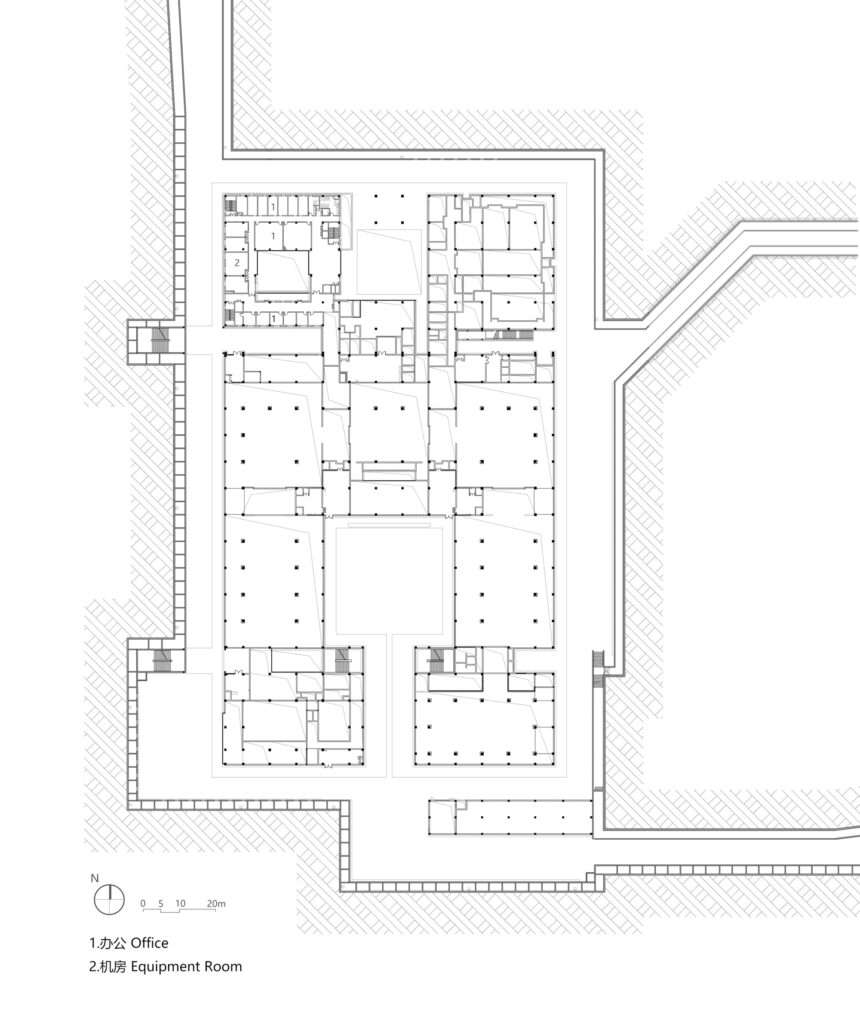 Black and white architectural floor plan diagram displaying the layout of the underground museum including offices, courtyards, and equipment rooms.