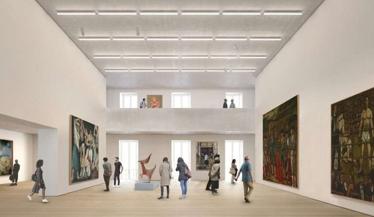 A double-height art gallery with white walls, timber flooring, paintings on display, and a mezzanine level.