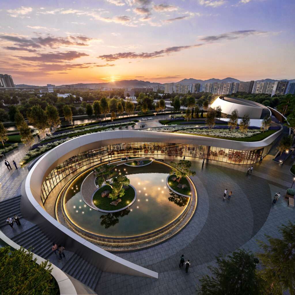 High-angle sunset view of a circular courtyard pavilion with a rooftop garden and central pond.