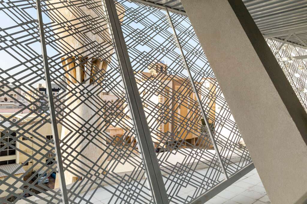 Interior perspective looking out through the intricate parametric screen at the Indonesian Consulate in Jeddah.