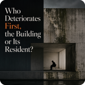 conceptual split-screen image contrasting a sleek dark architectural facade with heavily cracked, stained concrete. Inside a recessed concrete room, a solitary silhouetted figure sits hunched on a chair, accompanied by the text "Who Deteriorates First, the Building or Its Resident?".
