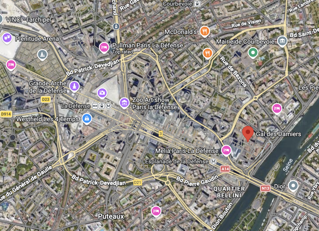 Satellite map of the La Défense district in Paris, highlighting its distinctive almond-shaped ring road system and the central urban esplanade.