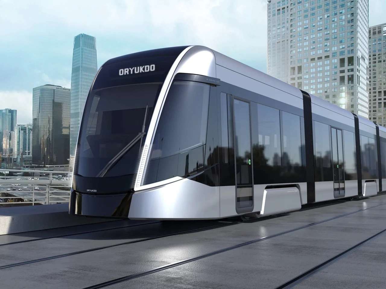 Futuristic silver and black Oryukdo tram with a curved aerodynamic front facade gliding on tracks against a modern city skyscraper skyline background.
