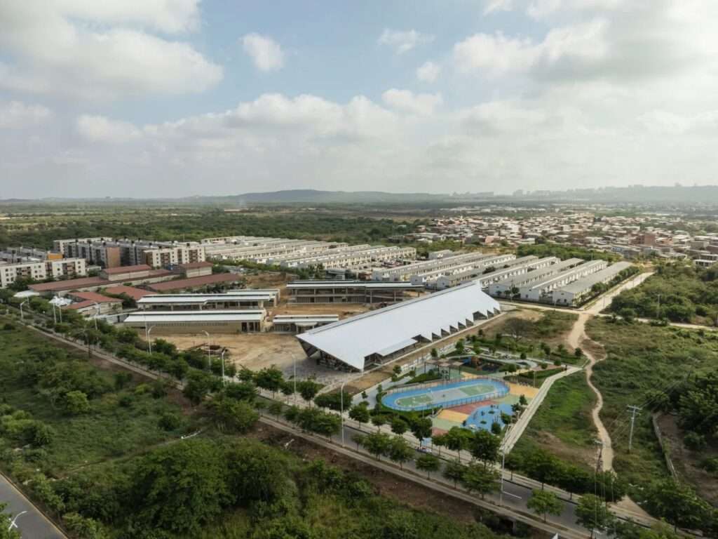 Wide aerial view of the Vilas de San Pablo Cultural Center embedded within the surrounding residential neighborhood.
